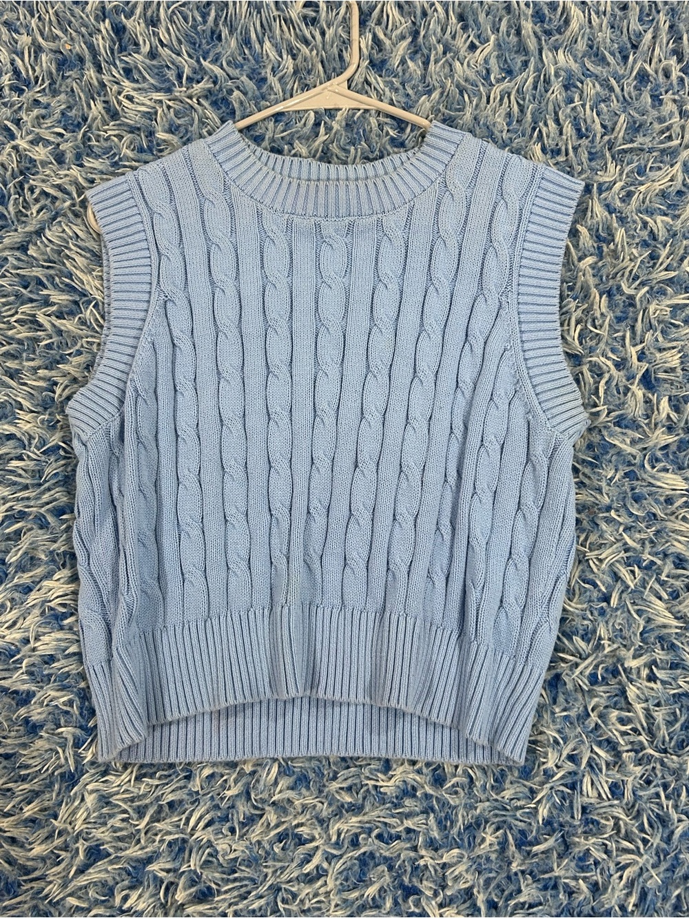 Blue sweater vest